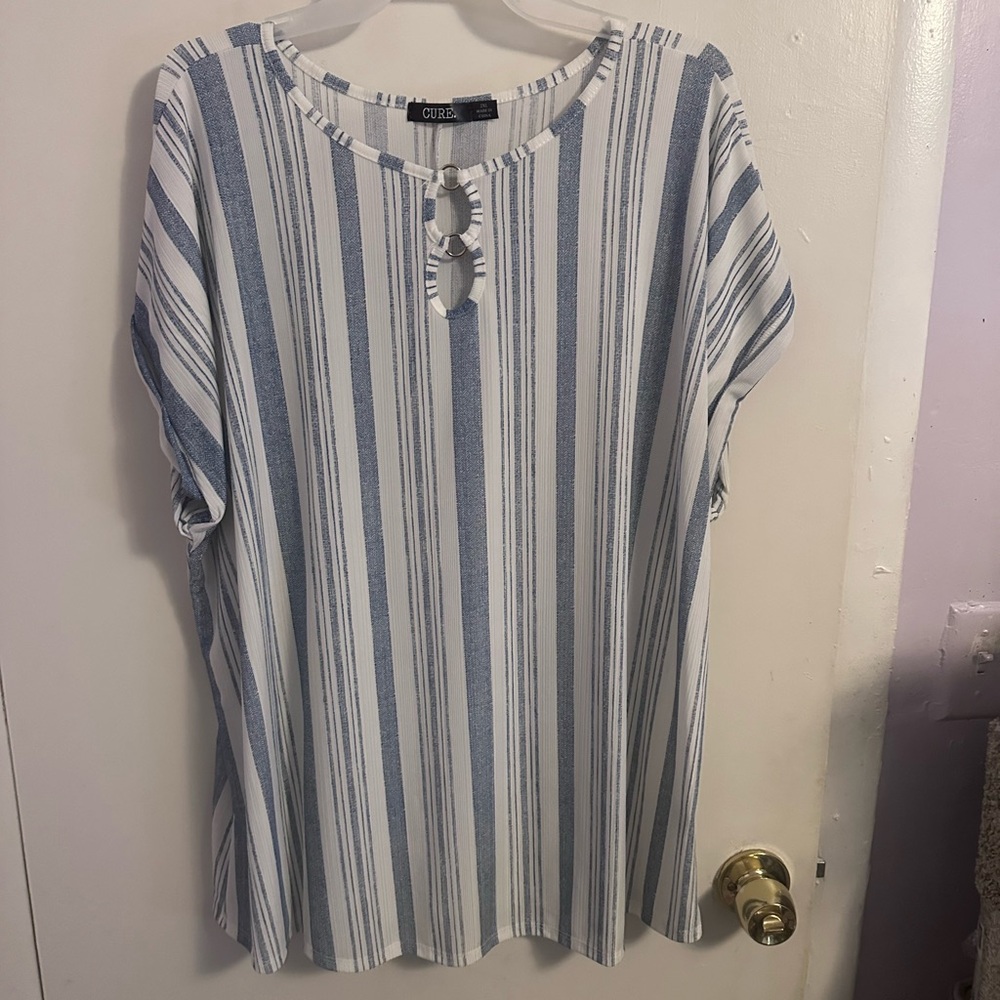 New but without tags 2X cool shirt made by CURE
